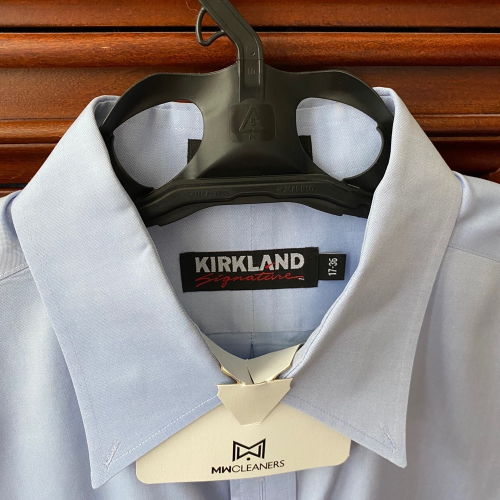 Kirkland men’s blue button-down dress shirt.